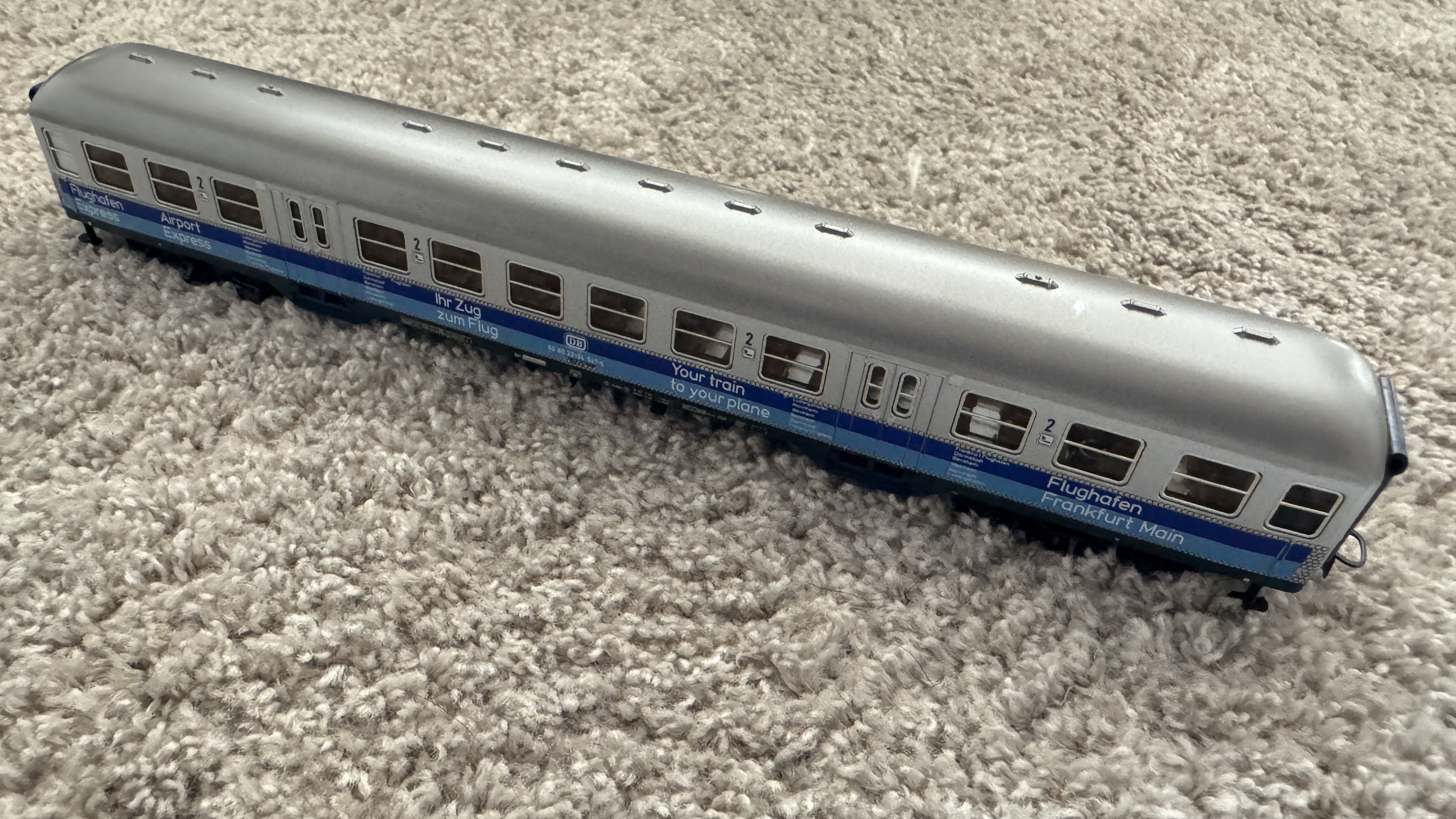 Titelbild Silberling AirPort Express 2. Klasse