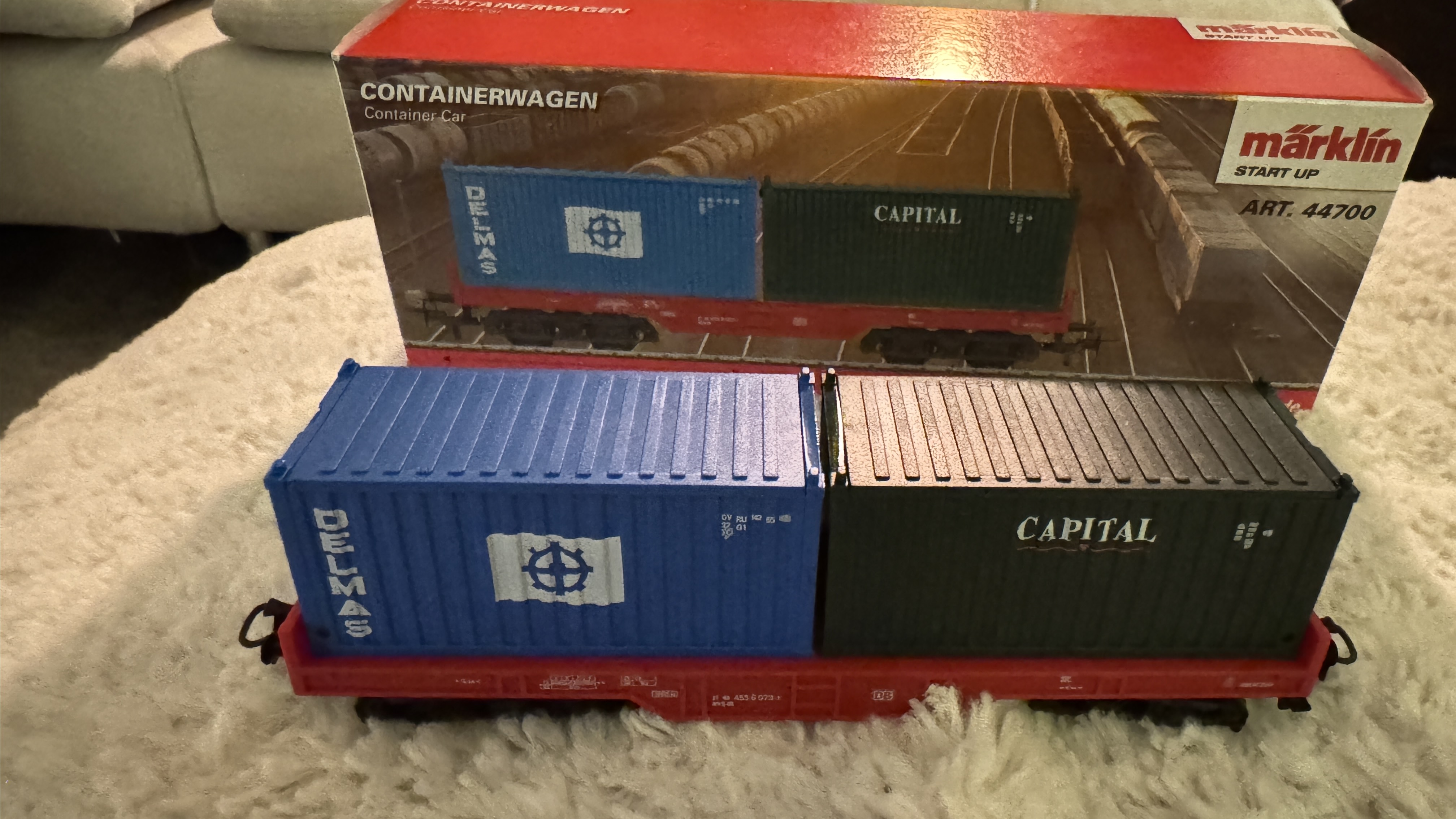 Titelbild Containerwaggon 4 achsig Delmas / Capital